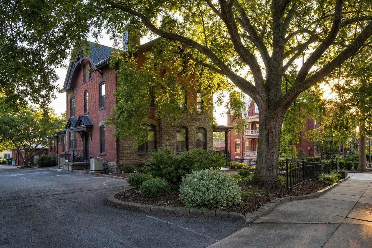 Bethlehem-area residential street with mature trees and managed property access