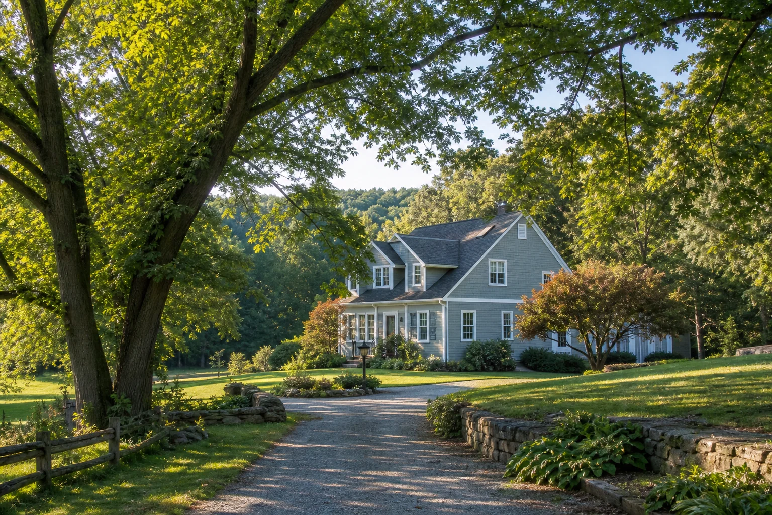 Semi-rural Zionsville area home framed by mature deciduous trees and a wooded edge